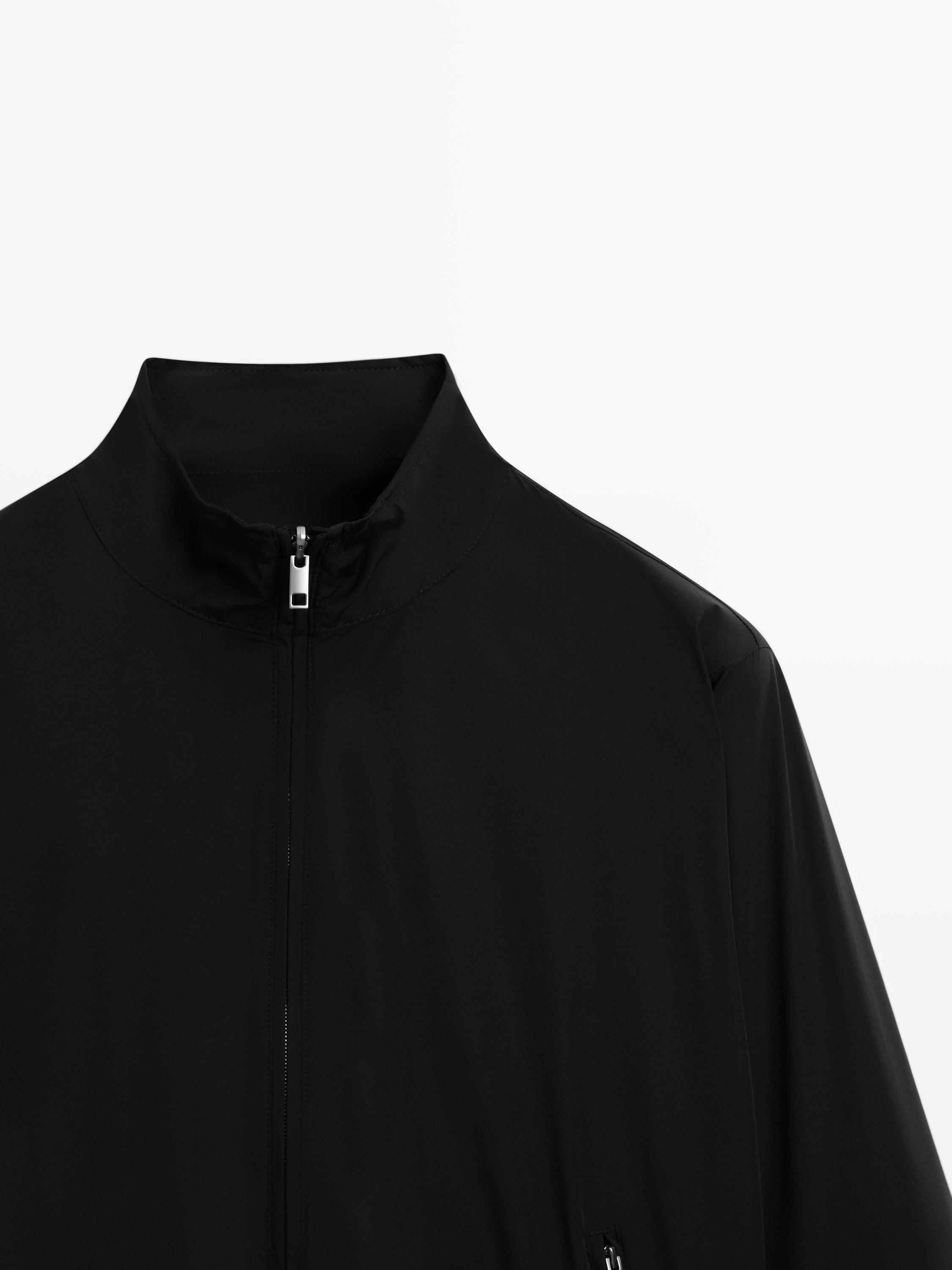 Veste réversible à col montant